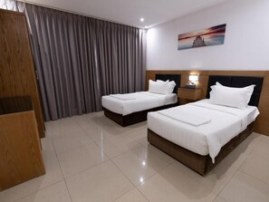 1 habitación, ropa de cama de alta calidad, cubrecamas y minibar 