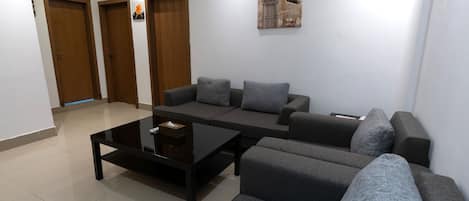 Apartment, 2 Bedrooms | Living area | 50-inch Smart TV with premium channels, TV, fireplace