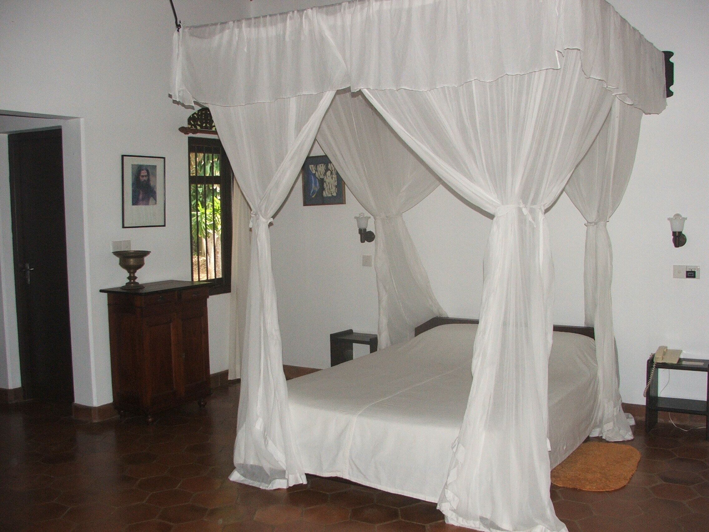 Desk, blackout drapes, bed sheets