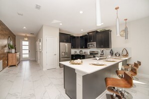 Fridge, microwave, oven, stovetop - EV_8812 - 8 Bed 5 Bath Villa with Screened-in Private Pool, Games Room, Theater (Davenport)