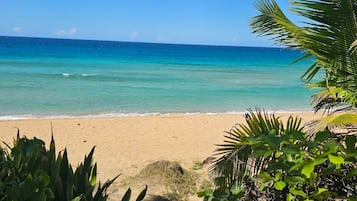 On the beach, sun-loungers, beach towels