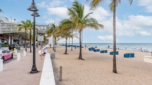 On the beach, sun loungers, beach towels