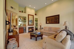 Smart TV, fireplace, books, music library