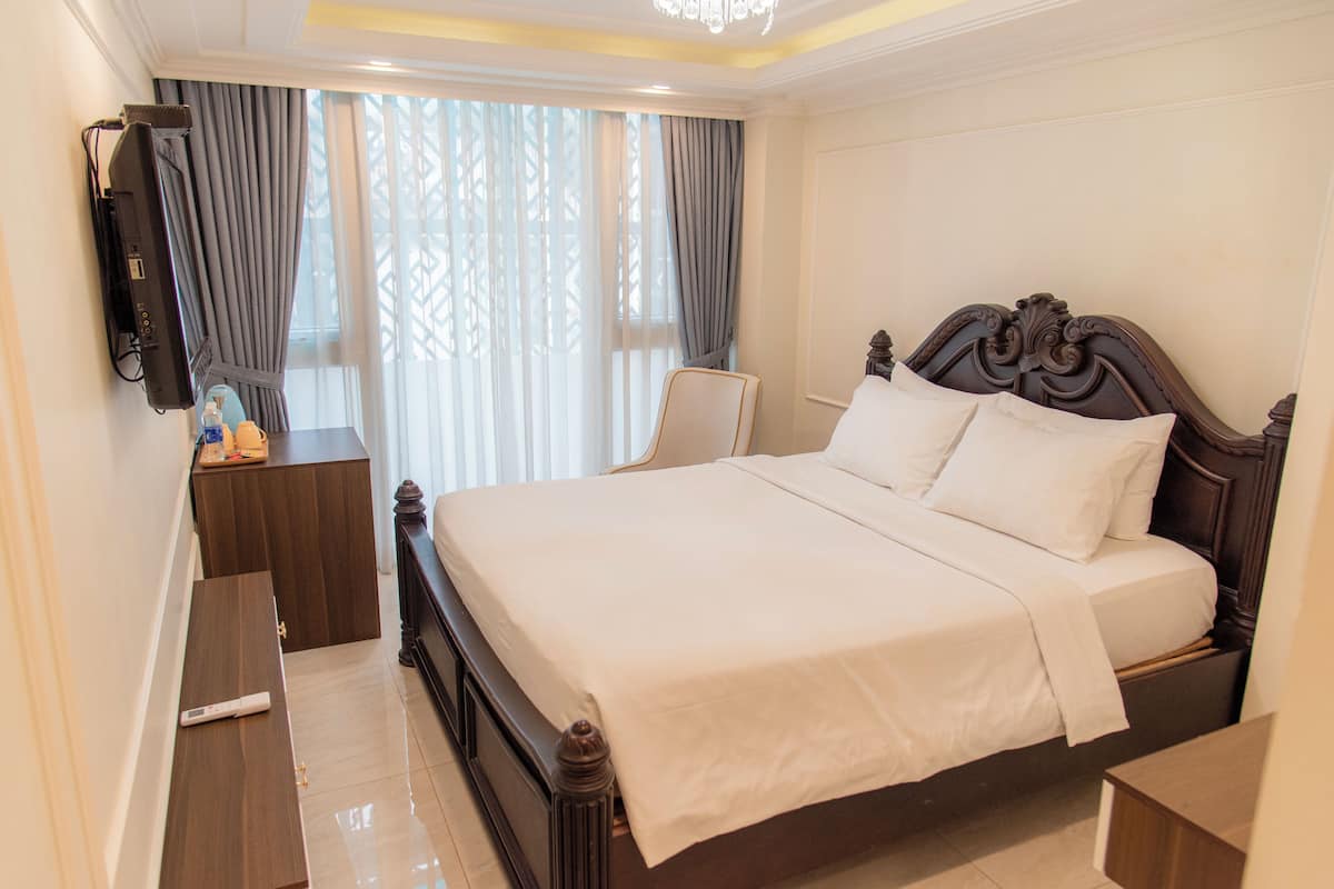 Habitación Deluxe doble | Minibar, escritorio, wifi gratis y ropa de cama