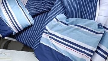 2 chambres, fer et planche Ă repasser, draps fournis