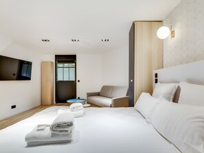 1 slaapkamer, een strijkplank/strijkijzer, wifi, beddengoed