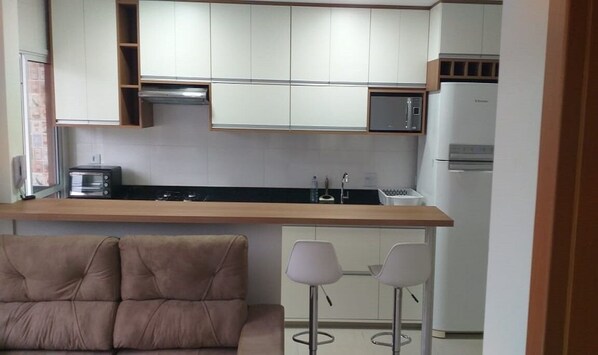 Interior - Encantos de Ubatuba apartment. (Estufa II)