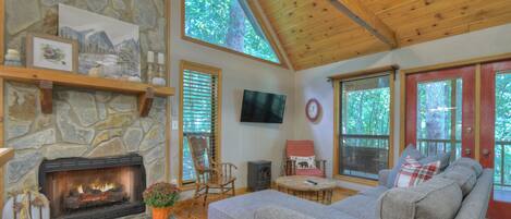 Smart TV, fireplace, foosball, books