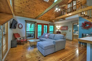 Smart TV, fireplace, table football, books