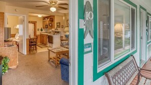 A home interior with a kitchen, dining area, and a living room. - T10 - Skiff @ Trollers Lodge (Depoe Bay)