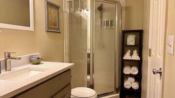 Shower, hair dryer, towels, soap