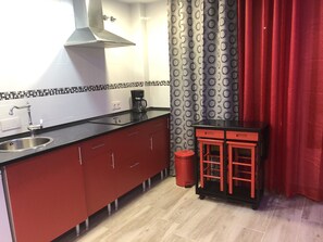 Fridge, microwave, stovetop, coffee/tea maker