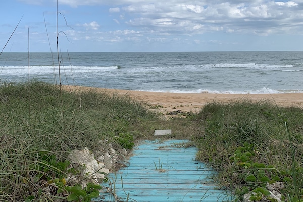 On the beach, sun-loungers, beach towels