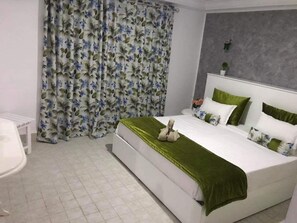 Familienapartment | 3 Schlafzimmer, Zimmersafe, laptopgeeigneter Arbeitsplatz