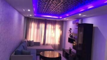 Family Apartment | Living room | 32-inch LED TV with satellite channels, TV