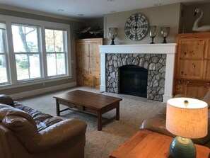 Smart TV, fireplace, DVD player, books