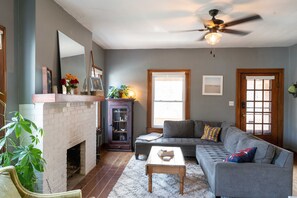 Smart TV, fireplace, books, stereo