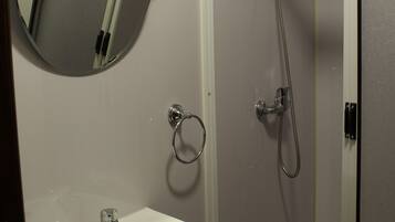 Classic Twin Room | Bathroom | Shower, rainfall showerhead, hair dryer, towels