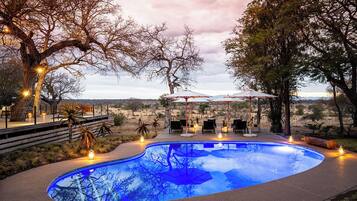Outdoor pool, pool umbrellas, sun loungers