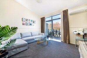 Private 2 Bedroom Apartment | Living room | Flat-screen TV - Gorgeous Lake & Mountain View Apartment (Queenstown)