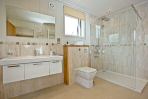 Bathtub, hair dryer, towels
