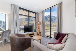 Private 2 Bedroom Executive Apartment | Living area | Flat-screen TV, Netflix, streaming services