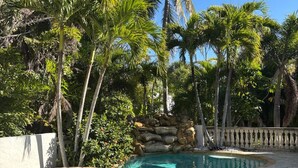 Outdoor pool, a heated pool - Dog-friendly gated spacious Siesta Key Getaway — Pool, Spa, & Mancave. (Siesta Key)