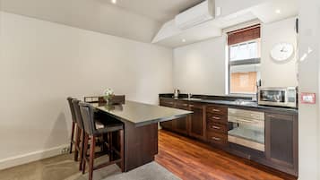 Private 2 Bedrooms Executive Apartment | Private kitchen | Fridge, microwave, oven, stovetop