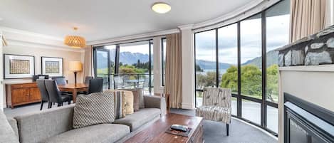 Private 2 Bedroom Deluxe Apartment | Living area | Flat-screen TV