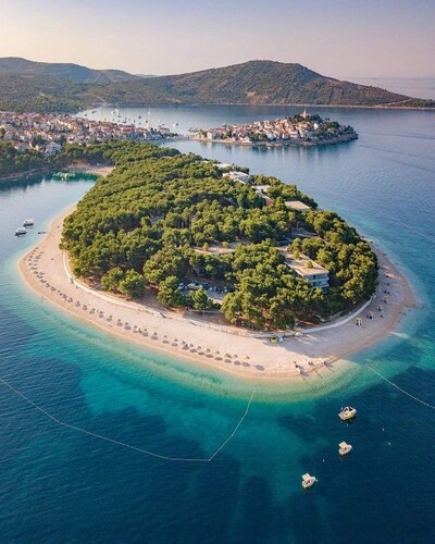 Stone villa in the Dalmatian style and Mediterranean charm.
