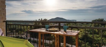 Stone villa in the Dalmatian style and Mediterranean charm.