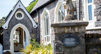 Unique historic school‑house conversion with log burner