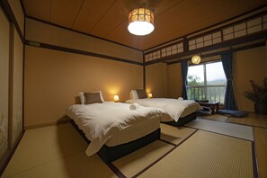 Camera Classic con letto matrimoniale o 2 letti singoli, 1 camera da letto | Copriletto in piuma, Wi-Fi gratuito, lenzuola