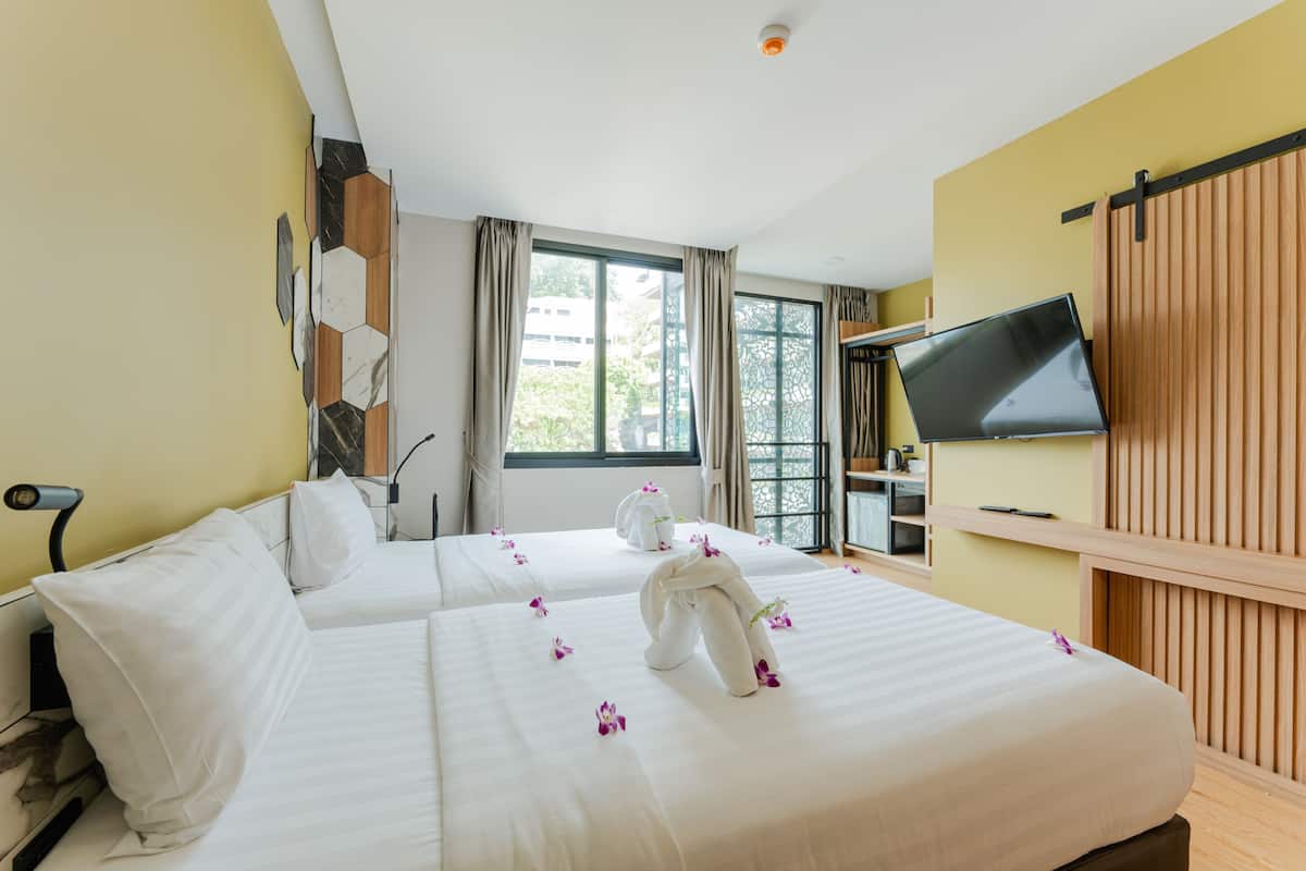 Superior Twin Room | Down comforters, in-room safe, individually decorated