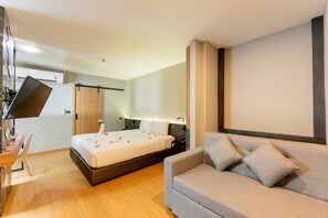 Studio Familial, 1 très grand lit et 1 canapé-lit | Couette en duvet d'oie, coffres-forts dans les chambres