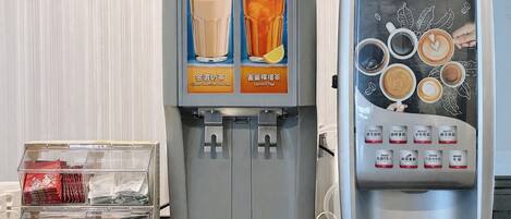 A coffee machine with a selection of beverages and a display of coffee pods.