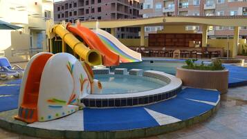 Outdoor pool, pool umbrellas, sun loungers