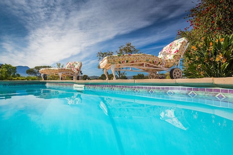 2 outdoor pools, pool umbrellas, sun loungers