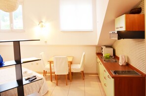 Studio | Private kitchenette | Fridge, stovetop, electric kettle, cookware/dishes/utensils - Apartments Prunus (Dubrovnik)