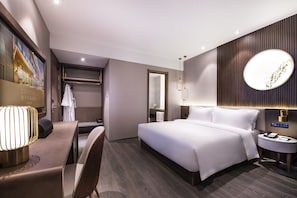 Habitación doble | Edredón, minibar, cortinas blackout y wifi gratis