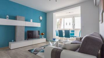 Apartment, 2 Bedrooms | Living room | Flat-screen TV