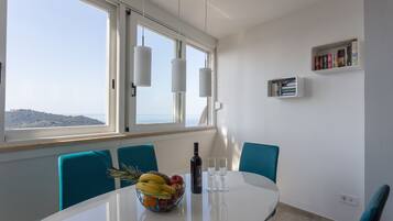 Apartment, 2 Bedrooms | Living room | Flat-screen TV