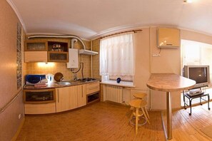 Apartment | Private kitchen | Fridge, microwave, stovetop, electric kettle
