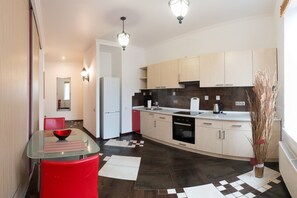 Enjoy cooking and dining in this kitchen with a central island, oven, and dishwasher.