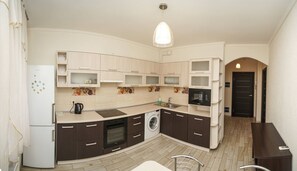 Apartment | Private kitchen | Fridge, microwave, oven, stovetop - Apart Kiev Chernovola 27 (Kyiv)