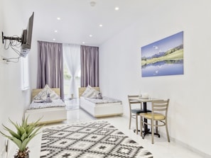 Standard-Doppel- oder -Zweibettzimmer, Gemeinschaftsbad | Kostenloses WLAN, Bettwäsche