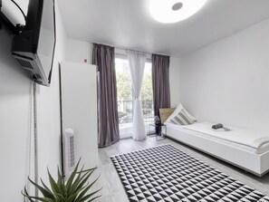 Quarto solteiro standard, banheiro compartilhado | Wi-Fi de cortesia, roupa de cama