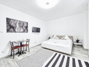 Standaard kamer, 1 twee- of 2 eenpersoonsbedden, gedeelde badkamer | Gratis wifi, beddengoed