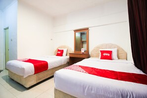 Standard Twin Room | Free WiFi, bed sheets - OYO 1905 Davonsa  Homestay Syariah (Pekanbaru)