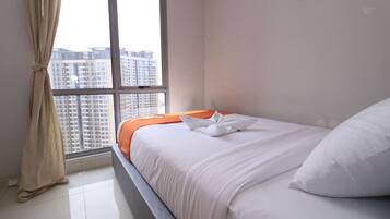 Apartamento, 2 quartos | 2 quartos, Wi-Fi de cortesia, roupa de cama